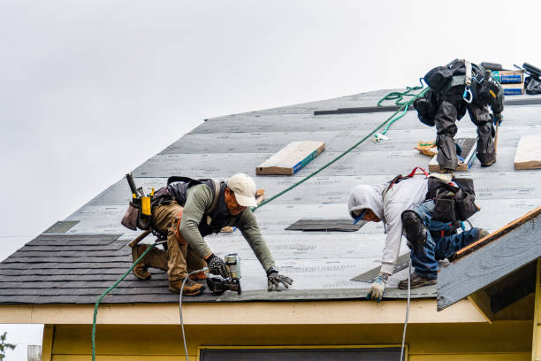 Professional Metal Roofing technician working in Wellesley, MA